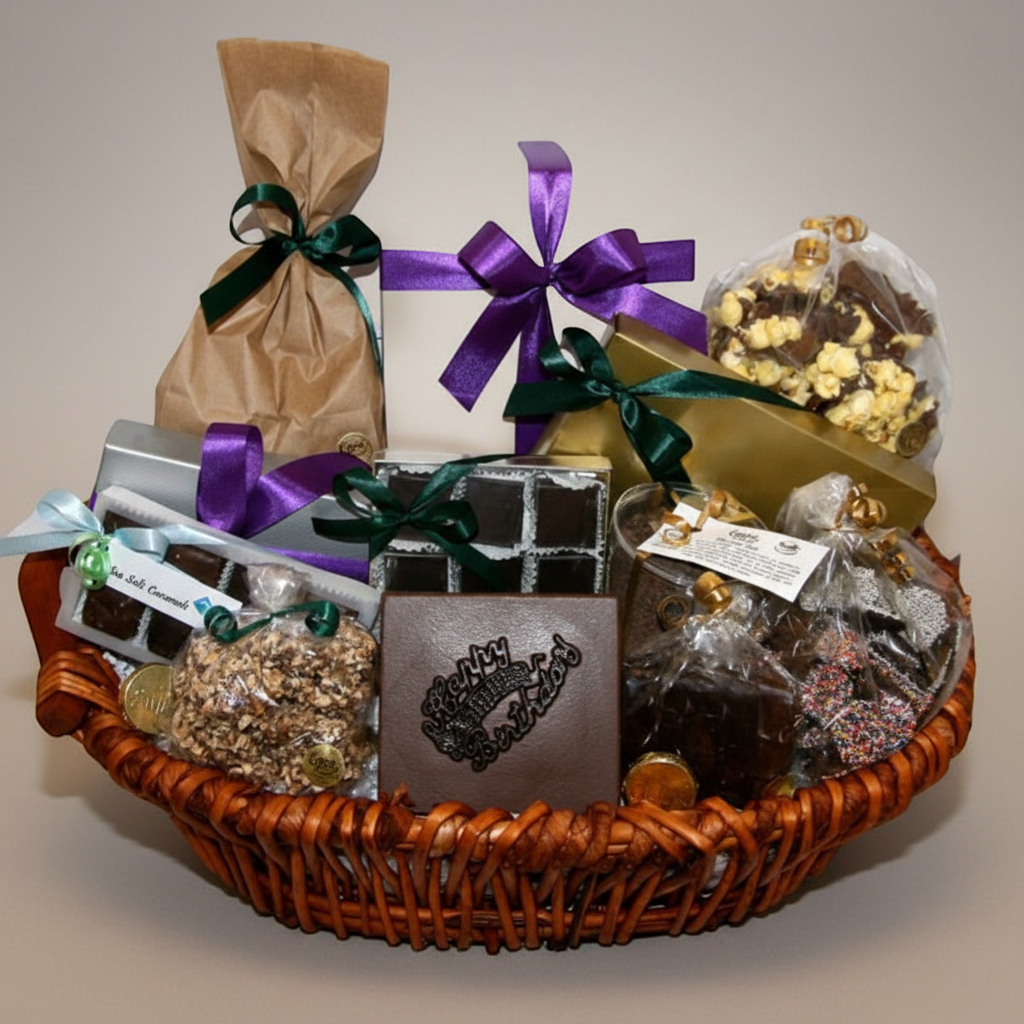 Enjou Chocolat birthday gift basket with assorted chocolates, sea salt caramels, chocolate covered pretzels, popcorn, and a Happy Birthday plaque.