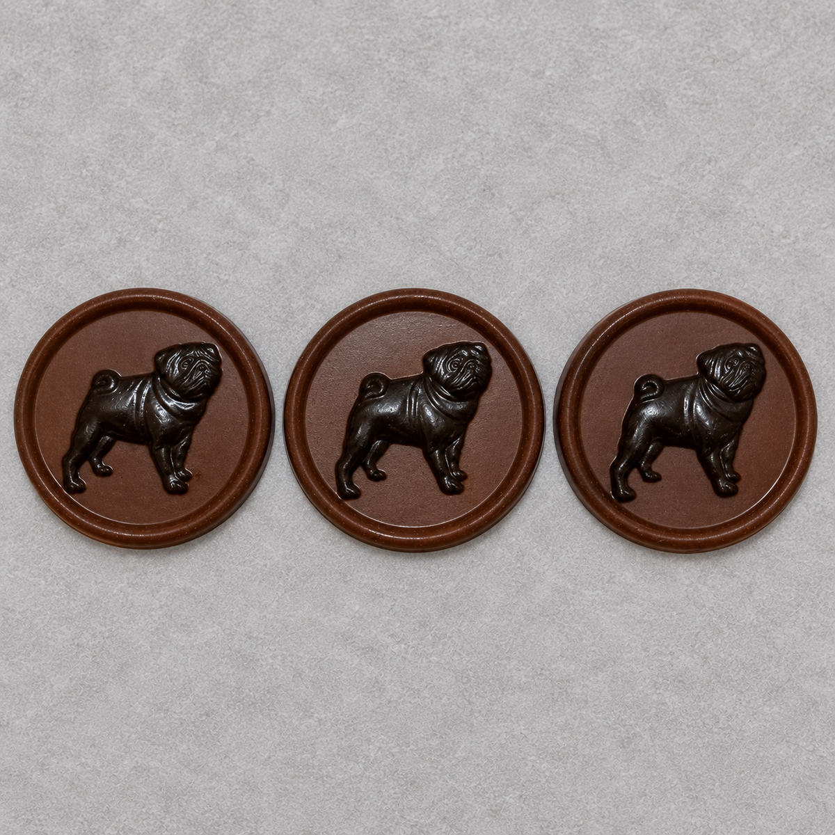 Pug Discs on Enjou textured gray background